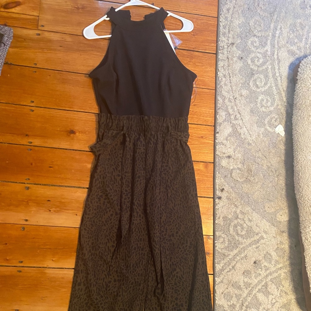 never been worn Francesca’s jumpsuit.